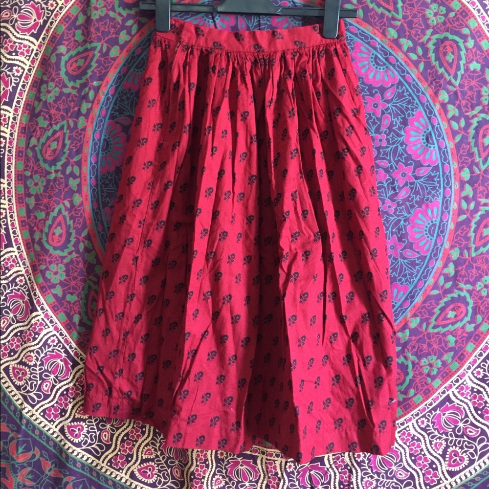 Red skirt with black flower print
